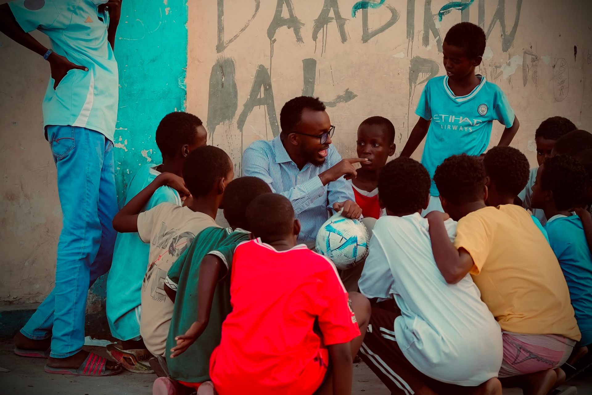 Coach leading a youth football session in Mogadishu